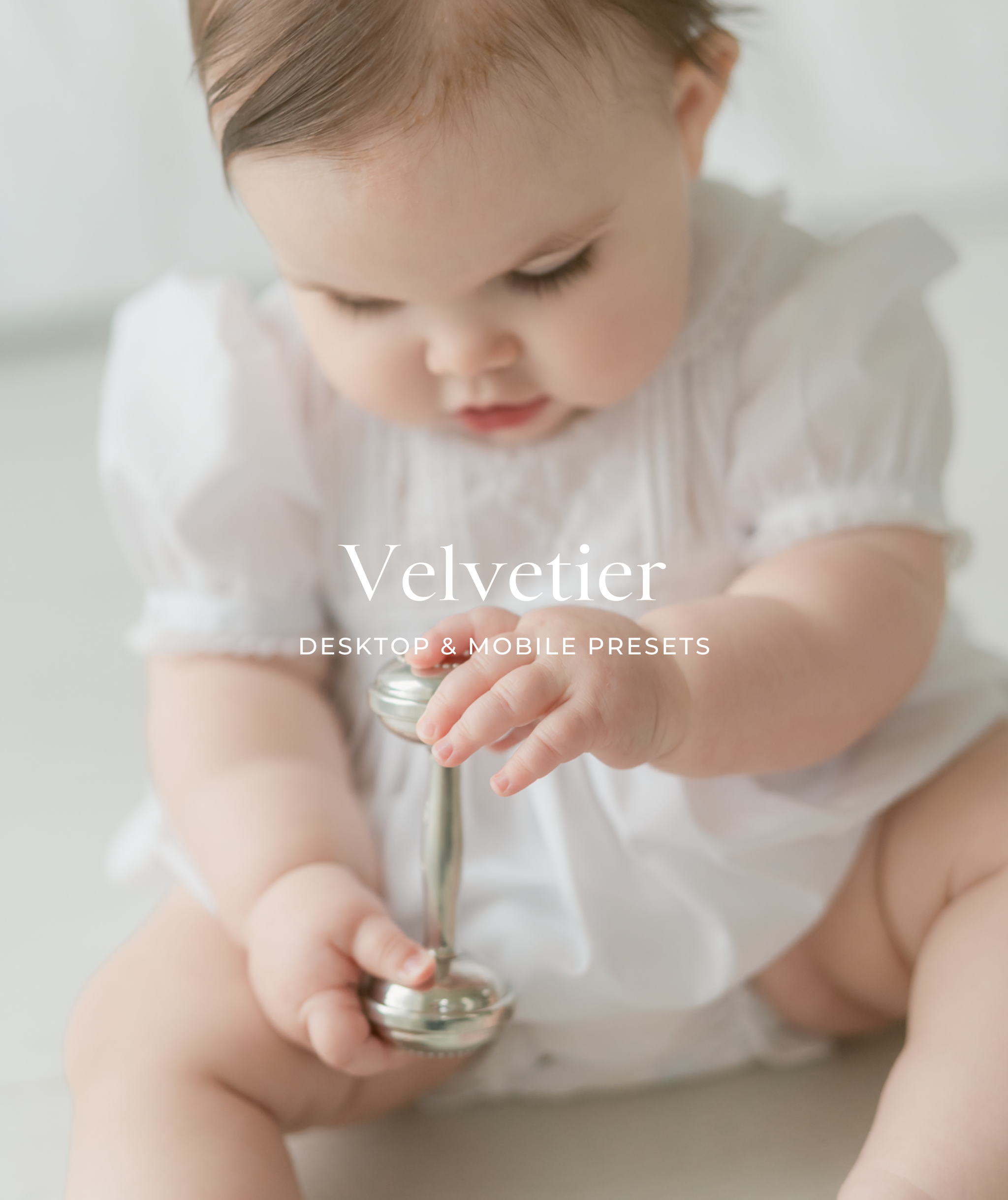 Baby in a white outfit holding a silver spoon with 'Velvetier' branding.